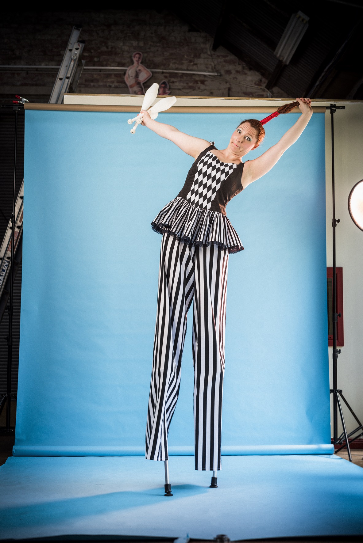 Harlequin hair pull stilt walking